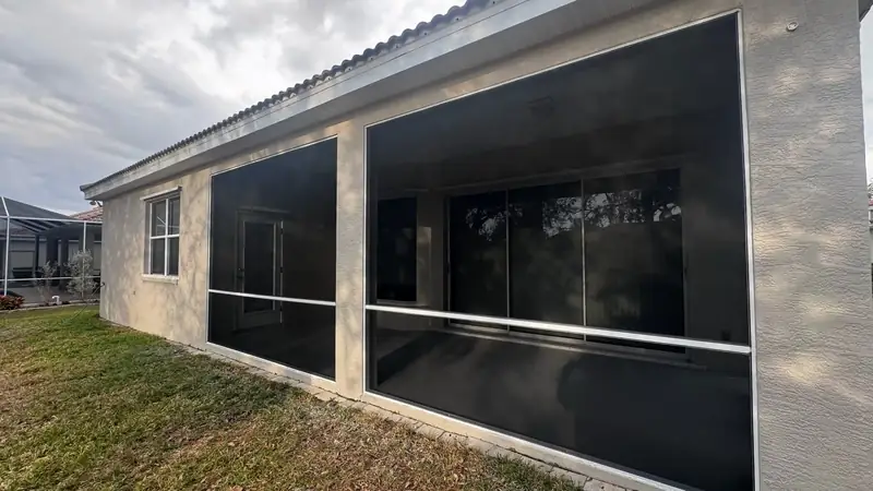 Custom aluminum screen enclosure with dark mesh screens