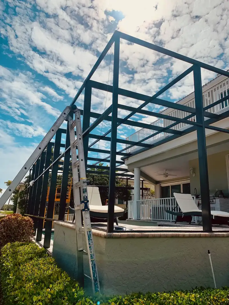 New pool cage construction in progress—aluminum framing built from scratch