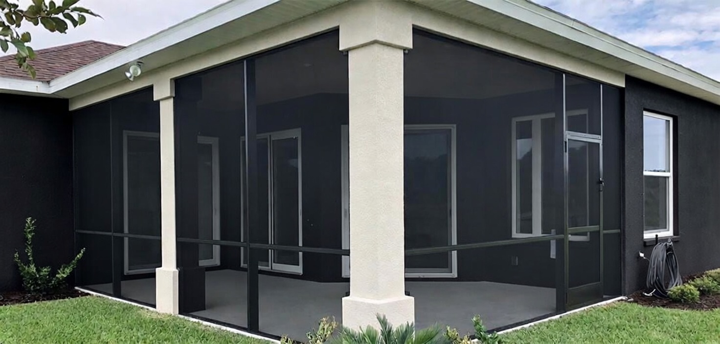 Custom aluminum screen enclosure on a home patio